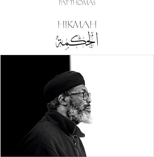 Album cover featuring Pat Thomas in profile against a split black and white background.
