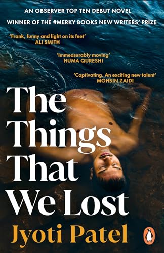 Book cover: a person floating in water, title “The Things That We Lost”.