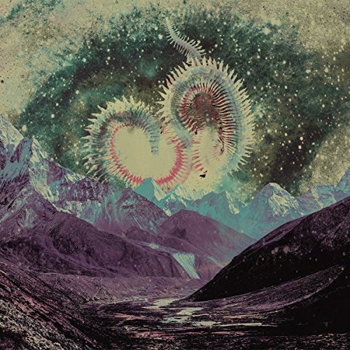 CD cover with swirling, colorful patterns over a mountainous landscape.