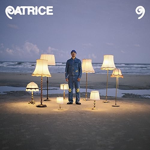 Album cover for Patrice’s “9” featuring a man among lamps on a beach.