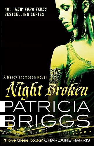 Book cover: woman’s face with green and black urban background.