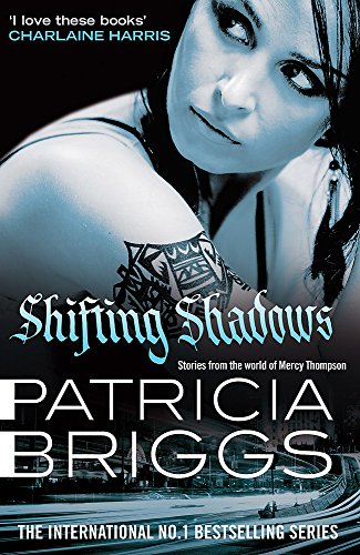 Book cover: woman with tattoos, title "Shifting Shadows" by Patricia Briggs.