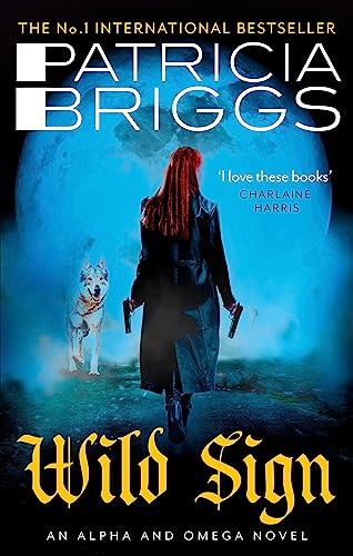 Book cover: woman with guns, wolf, and moonlit, snowy landscape.