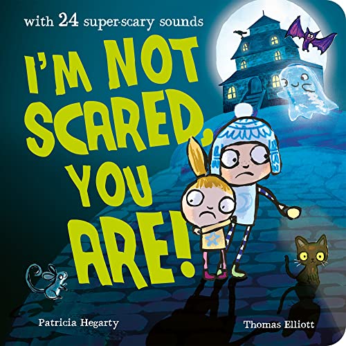Children’s book cover with spooky haunted house, ghosts, and scared kids.