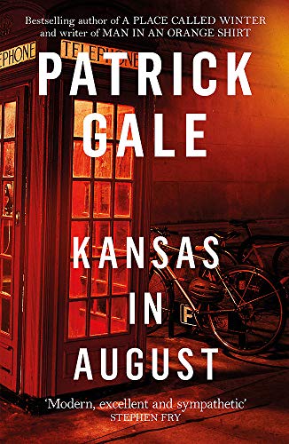 Book cover: red phone booth, bicycle, title "Kansas in August" by Patrick Gale.