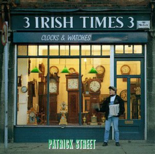 "Album cover featuring a man outside a clock shop with 'Patrick Street' written below."