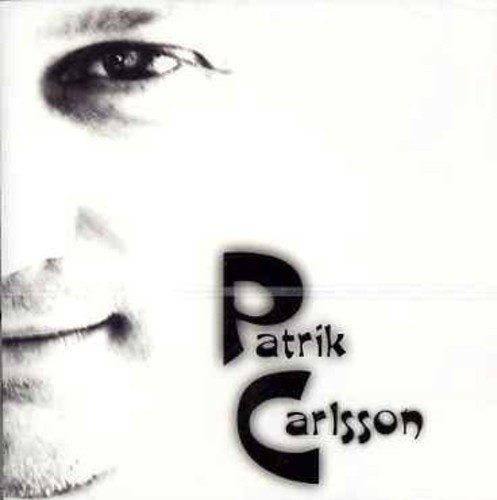 Close-up of a face with bold text "Patrik Carlsson" on a white background.