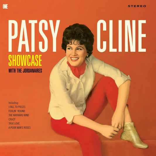 Patsy Cline album cover, orange background, portrait of singer in white jacket.