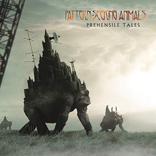 "Album cover featuring a giant ape with a castle on its back in a foggy landscape."