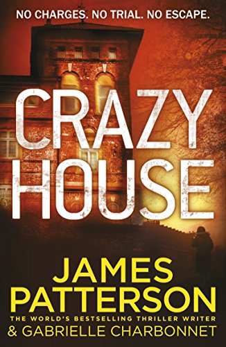 Book cover forL featuring a dark brick building with glowing windows and bold text.