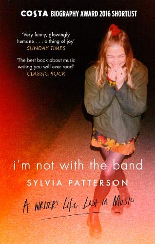 Book cover: woman in jacket, title “I’m Not with the Band” by Sylvia Patterson.