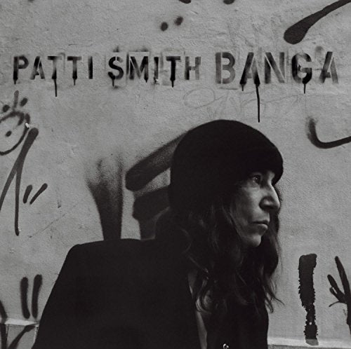 Black and white album cover featuring Patti Smith and graffiti art.