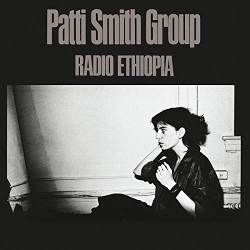 Black vinyl record in sleeve with Patti Smith Group and Radio Ethiopia album artwork.