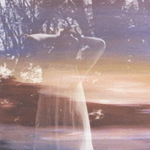 A blurry, double-exposed image of a woman in a dress against a forest background.