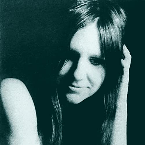 Black and white portrait of Patty Waters, looking downward.