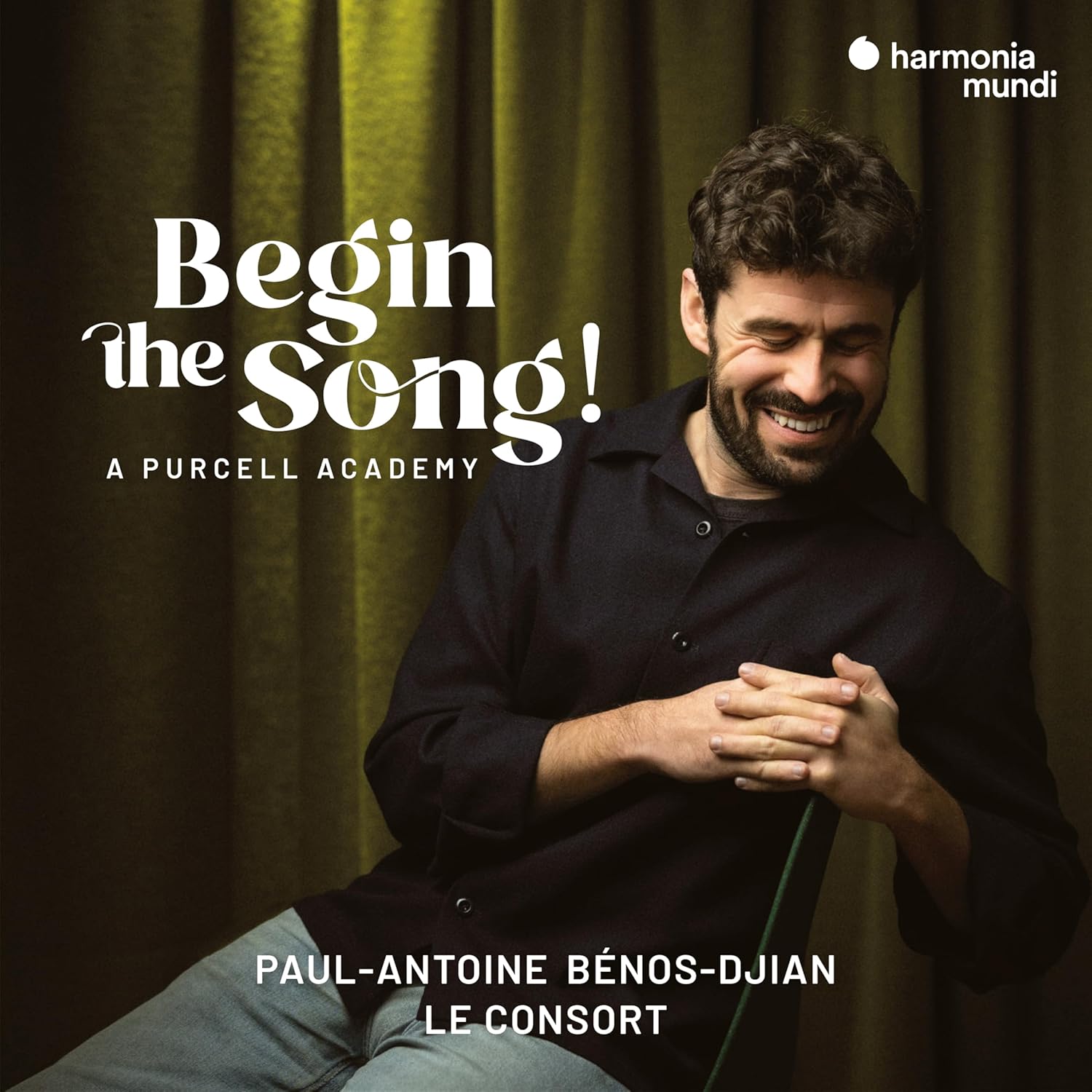 CD cover featuring smiling man and text: “Begin the Song!”