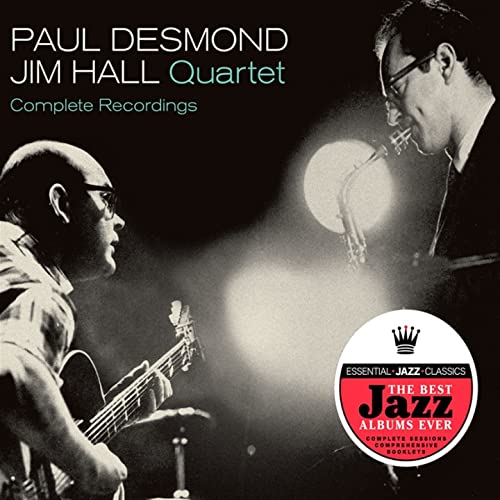 Black and white photo of Paul Desmond playing saxophone and Jim Hall playing guitar.