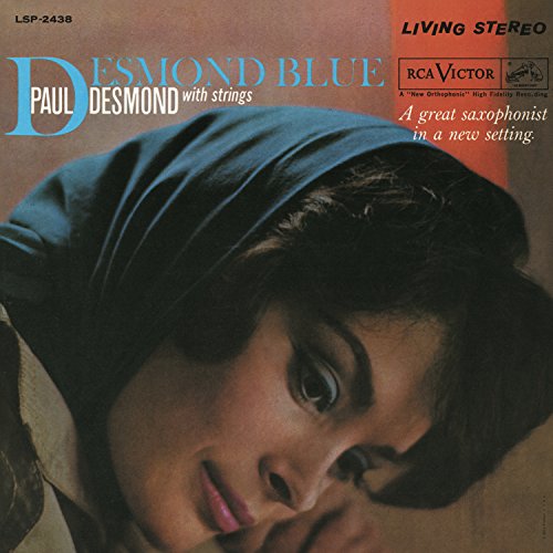Album cover for Paul Desmond’s “Desmond Blue” featuring a woman’s portrait.