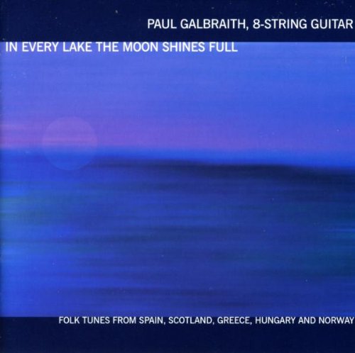 "Album cover with a serene blue lake and full moon, featuring white text."
