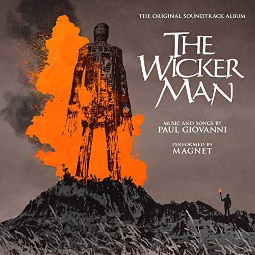 A giant wicker figure burns on a hill with text for The Wicker Man soundtrack.
