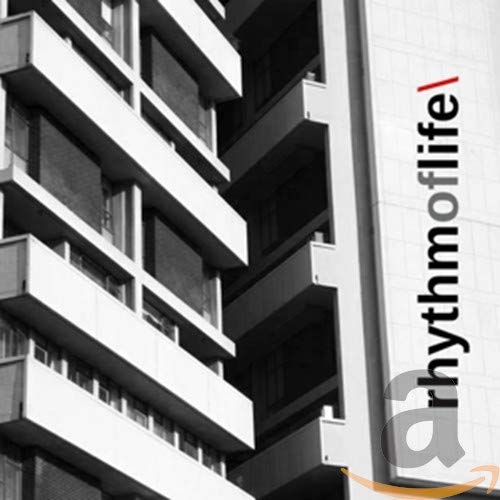 CD cover for Paul Haig’s “Rhythm of Life” with building facade.