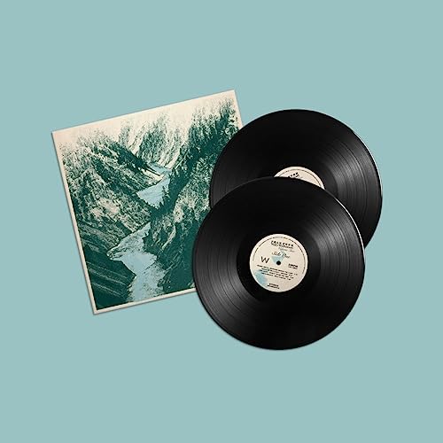 Two vinyl records and album cover with a mountain landscape.