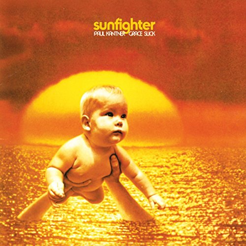 Album cover: baby "swimming" towards a bright orange sun.