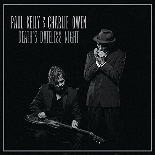 "Album cover with two men, one playing guitar, the other holding a harmonica."