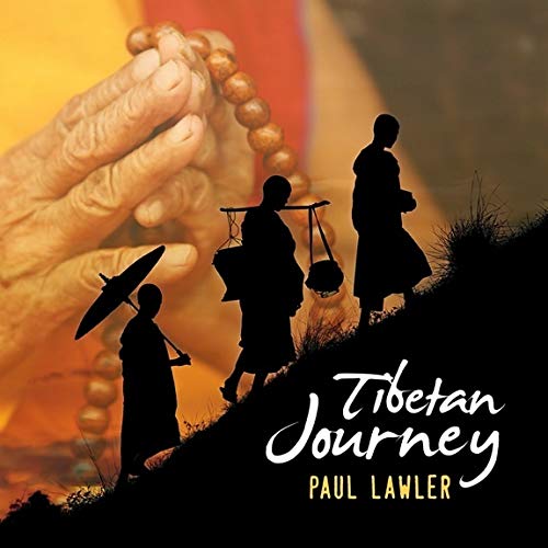 "Tibetan Journey" album cover featuring silhouetted monks and a hand holding prayer beads.