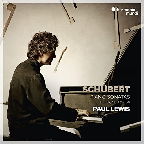 Paul Lewis at a piano, album cover for Schubert piano sonatas.