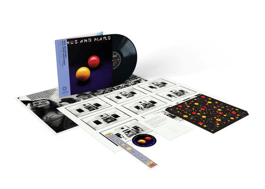 Venus and Mars" vinyl record by Paul McCartney & Wings, with artwork and inserts.