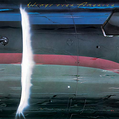 Airplane fuselage with red stripe and “Wings Over America” text.