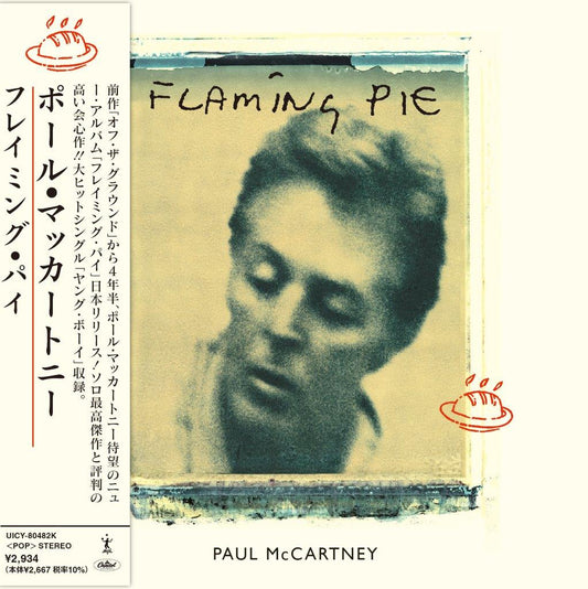 CD cover for Paul McCartney’s “Flaming Pie” with painted flames and portrait.