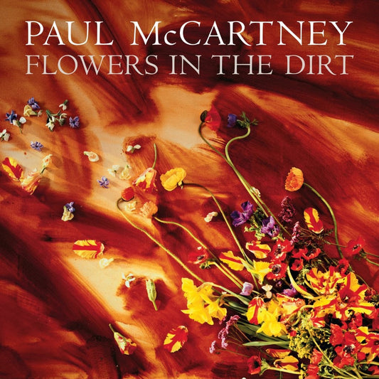 “Flowers in the Dirt” album cover by Paul McCartney, with scattered blooms.