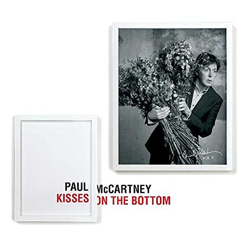Paul McCartney album cover, black and white portrait with flowers.