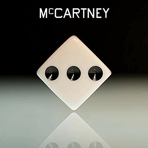 “McCartney III” album cover: a white diamond with three dark circles.