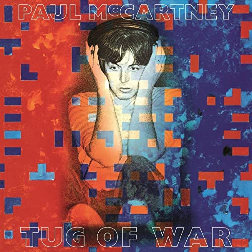 Paul McCartney album cover, "Tug Of War," with a distressed portrait.