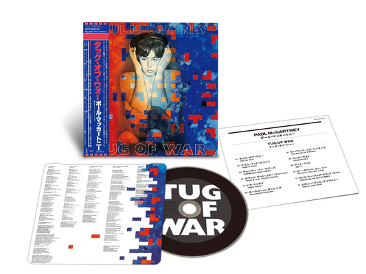 Paul McCartney’s “Tug of War” CD cover with a blue and red design.