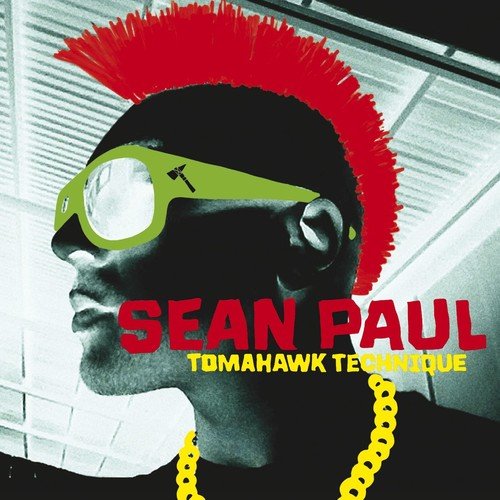 Sean Paul album cover: portrait with red mohawk and green sunglasses.