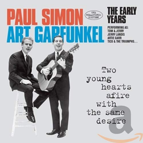 "CD cover featuring black-and-white photo of Paul Simon and Art Garfunkel in suits."