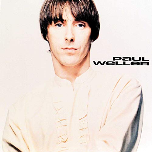 Paul Weller album cover featuring a portrait of the musician.