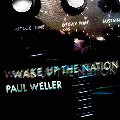Dark background with audio equipment dials and Paul Weller's album title in rainbow text.