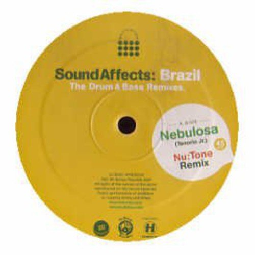 Yellow vinyl record with central label and a small sticker attached.
