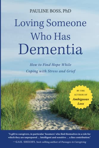 Book cover: “Loving Someone Who Has Dementia” with a coastal landscape.