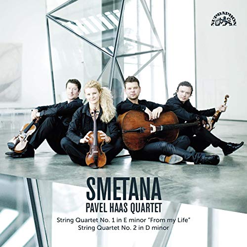 "Pavel Haas Quartet album cover featuring four musicians sitting with their string instruments."