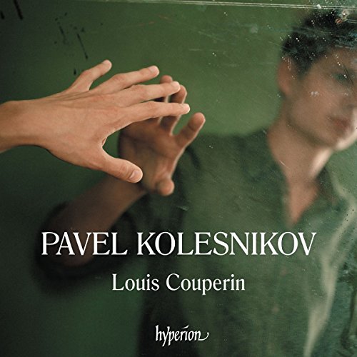 CD cover with a blurred portrait of a man and outstretched hand.