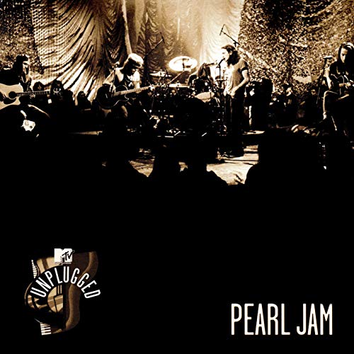 Pearl Jam performing live on MTV Unplugged, sepia toned image.