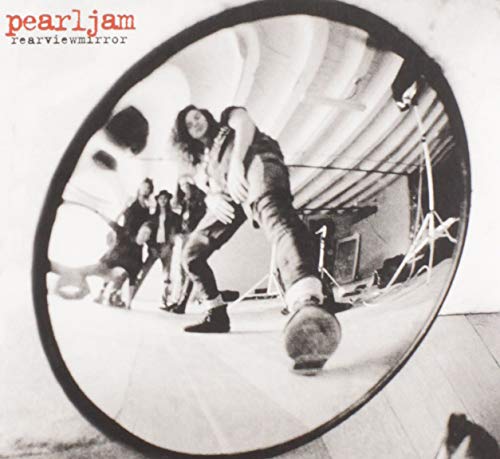 Pearl Jam’s “Rearviewmirror” album cover: band members in a distorted mirror.