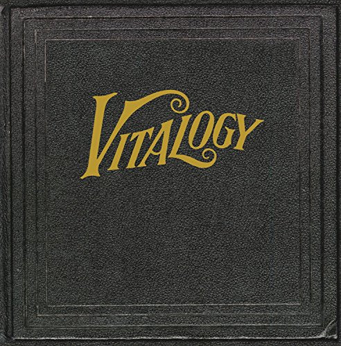Black textured vinyl cover with the word Vitalogy written in gold cursive script.