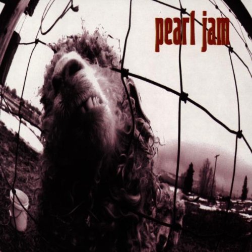 A sheep behind a wire fence with the text Pearl Jam in the corner.